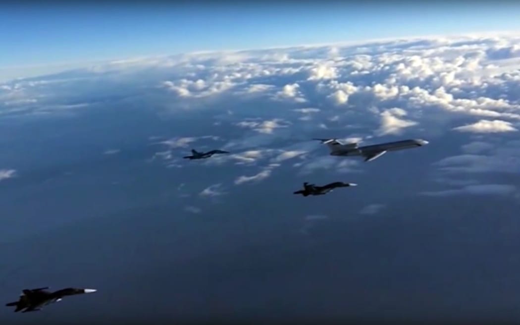 Russia's Tu-154 military transport planes have been regularly flying to Syria, escorted by Russian bombers (file picture)