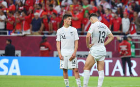 New Zealand's players react to their defeat in the FIFA World Cup 2022 playoff against Costa Rica. Costa Rica beat New Zealand 1-0 to claim the last spot at this year's World Cup finals.
