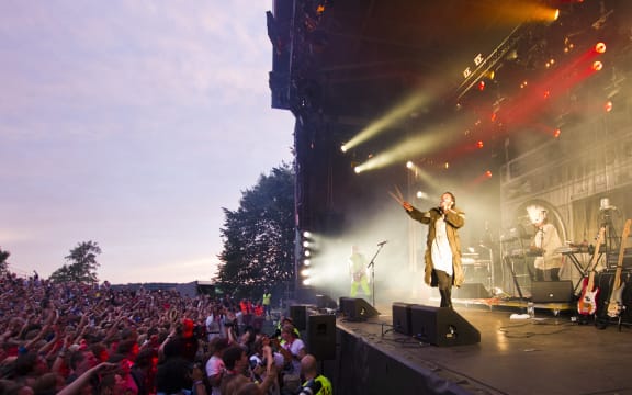 People attend the concert of Svein Berge and Torbjorn Brundtland, from the Norwegian electronic music duo Royksopp, during the Slottsfjell festival in Tonsberg on July 14, 2011.