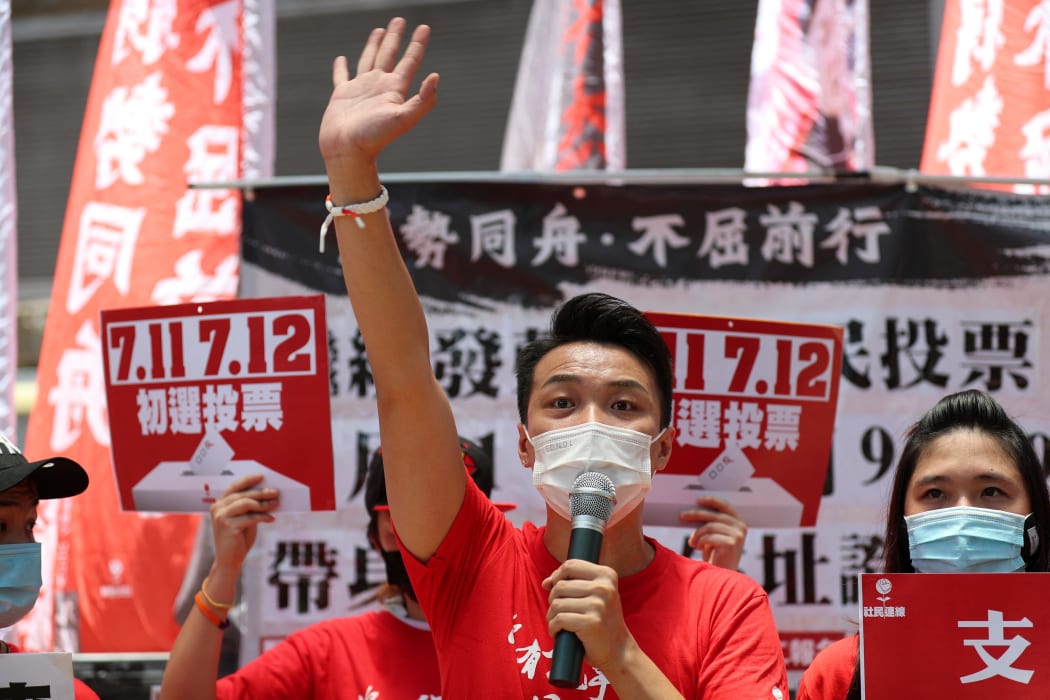 Jimmy Sham, a candidate of Kowloon West constituency, campaigns during a primary election in Hong Kong in July 2020.