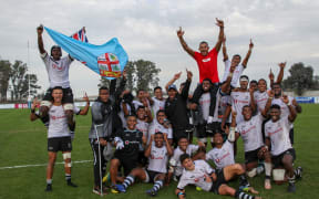 Fiji celebrate beating Scotland to retain their place in the World Rugby Under 20 Championship.