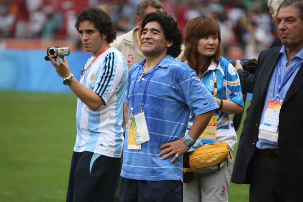 Diego Maradona celebrates after the men's soccer team of Argentina won the gold medal at the Beijing 2008 Olympic Games.