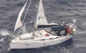 The SV Albatross and the sailor, spotted by the Orion.