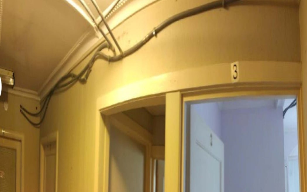 An investigation by MBIE's Tenancy Compliance and Investigations Team of the Takapuna property identified multiple issues including loose and exposed wiring and a lack of working smoke alarms.