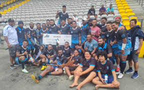 Bula 7s tournament Cup winners Duavata celebrate their final win.