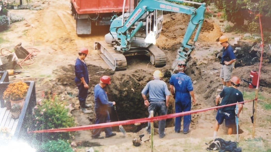 An old photo Daveena Dawrant has collected shows her garden dug up and remediation works, where an abandoned well was discovered.