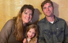 Vickie Hudson-Craig with her husband Ryan and daughter Ruby.