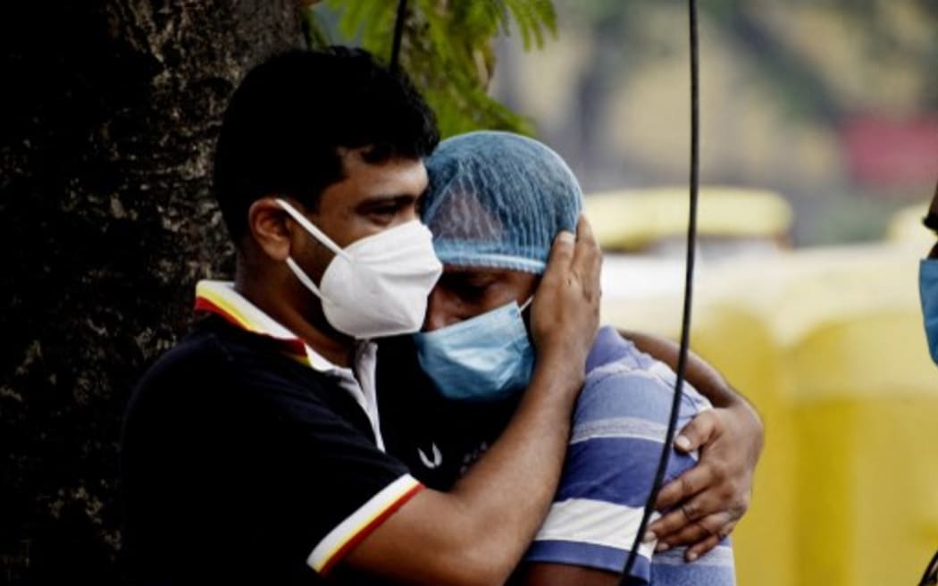 Family member breakdown, of a deceased covid-19 patient in a government hospital in Kolkata, India, 22 April, 2021.