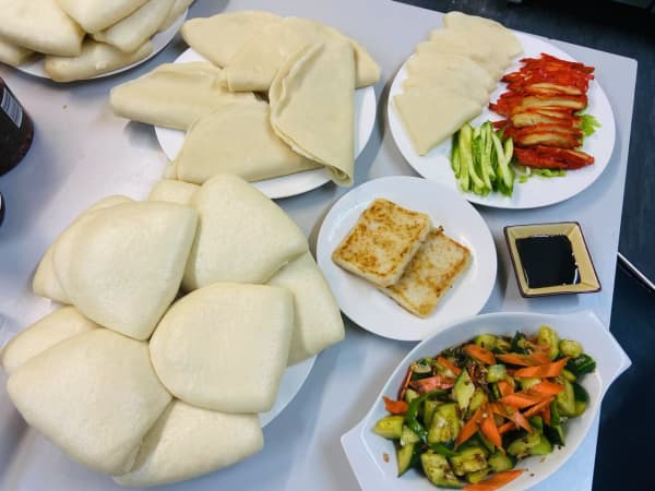 Joyve Cafe in Auckland serves vegetarian Peking duck (top right), a cucumber salad (bottom right) and turnip Cake (middle).