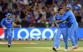 Indian players celebrate a South African wicket during the ICC Cricket World Cup match between India and South Africa at Melbourne Cricket Ground. 22 February 2015.