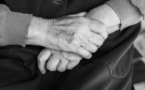 Elderly woman.