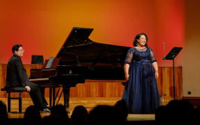 Pianist Juan Kim and Elisha Fa’i-So’oialo perform during Toiere.