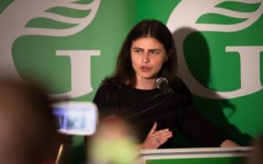 Green Party of Aotearoa MP Chloe Swarbrick speaks to the crowd at party HQ after securing the Auckland Central electorate in the 2023 election.