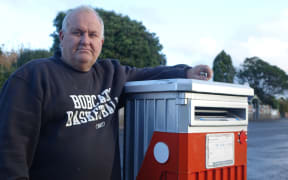 Stephen Parkes is surprised the mail box outside his auction business has been earmarked for removal.