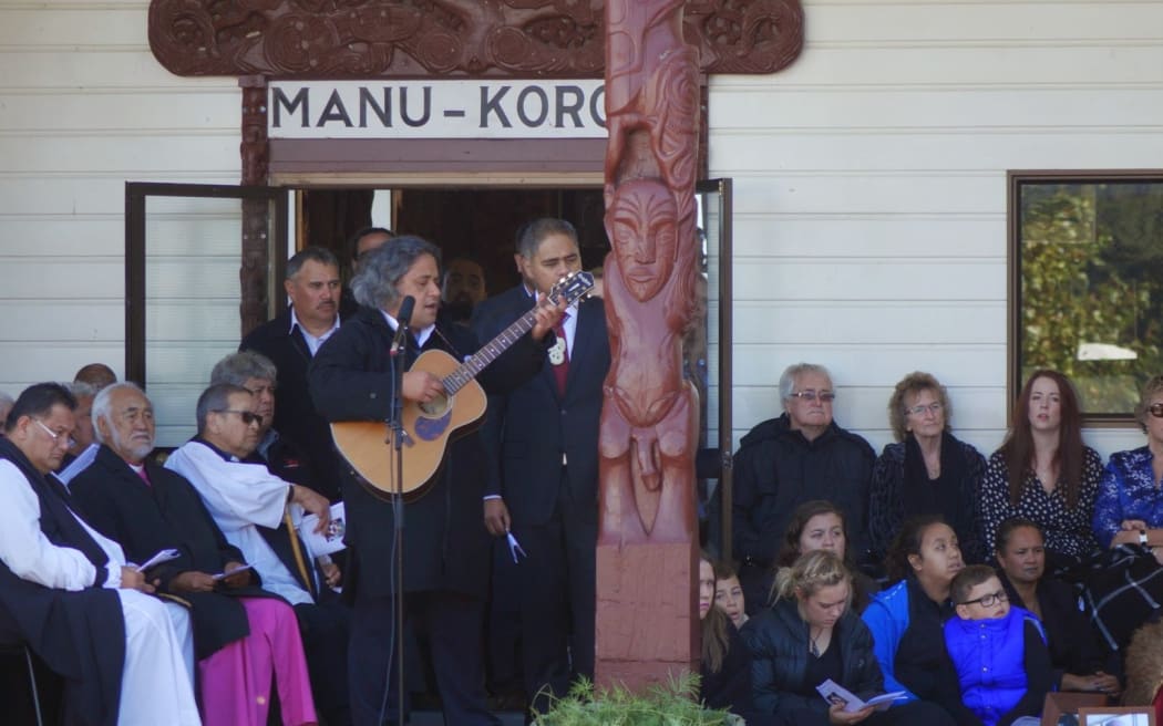 Erima Henare's twin sons sing a waiata to their father