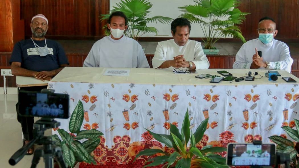 Church leaders in West Papua hold a press conference about ongoing conflict in Intan Jaya district where thousands fled to shelters