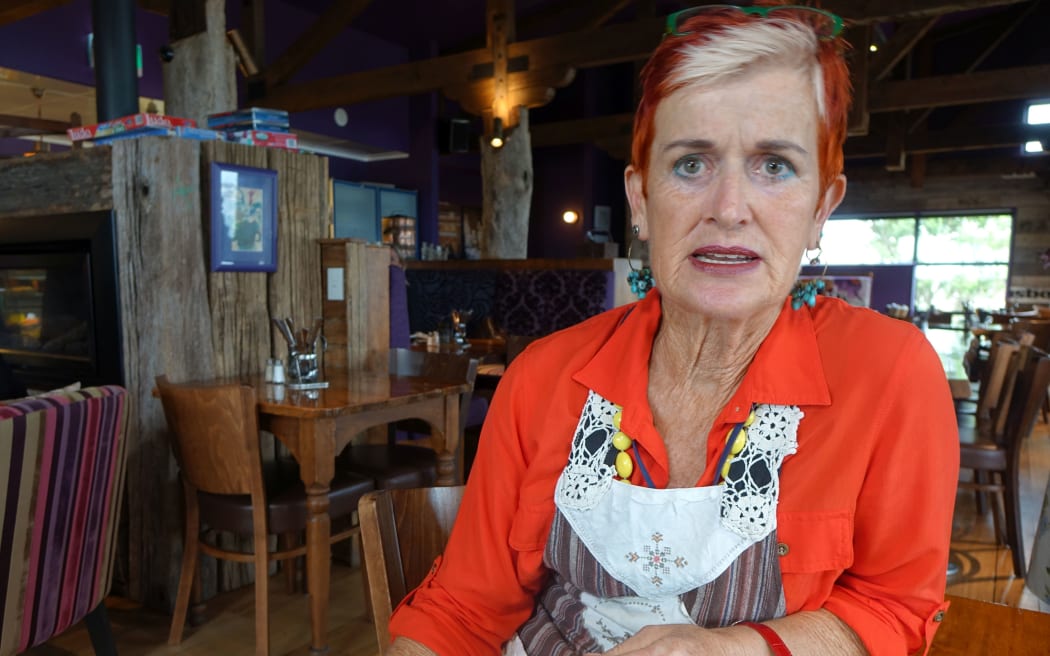 New Plymouth cafe owner is asking for compensation from Port Taranaki because a paid parking trial at the lee breakwater has left her out of pocket.