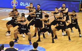 Tall Blacks perform the haka before the start of play.