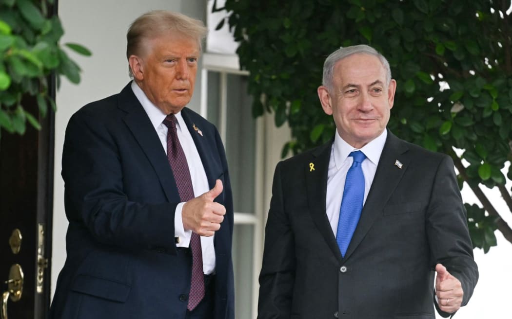 US President Donald Trump greets Israeli Prime Minister Benjamin Netanyahu as he arrives at the West Wing of the White House in Washington, DC on September 29, 2025. US