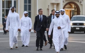 US Secretary of State Antony Blinken walks in Doha.