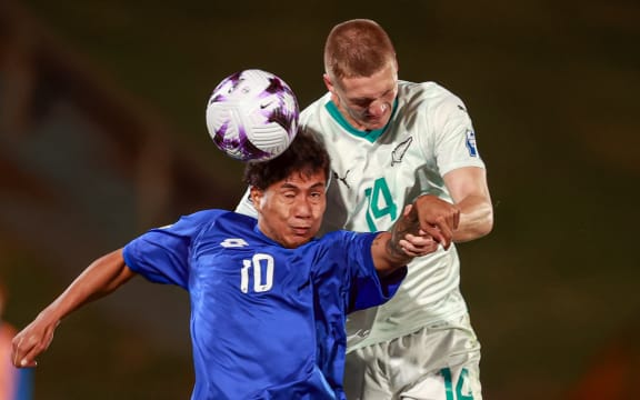 Samoa's Jarvis Vaai New Zealand's Finn Surman. FIFA World Cup 2026 - OFC Qualifiers, Samoa v New Zealand, Go Media Stadium Auckland, Monday 18 November 2024. Photo: Shane Wenzlick / www.phototek.nz