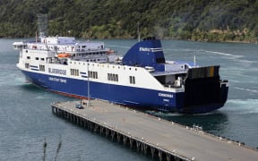 Bluebridge ferry the Connemara berthing at Picton wharf, helped by a tug, after earlier hitting the wharf while attempting to berth.