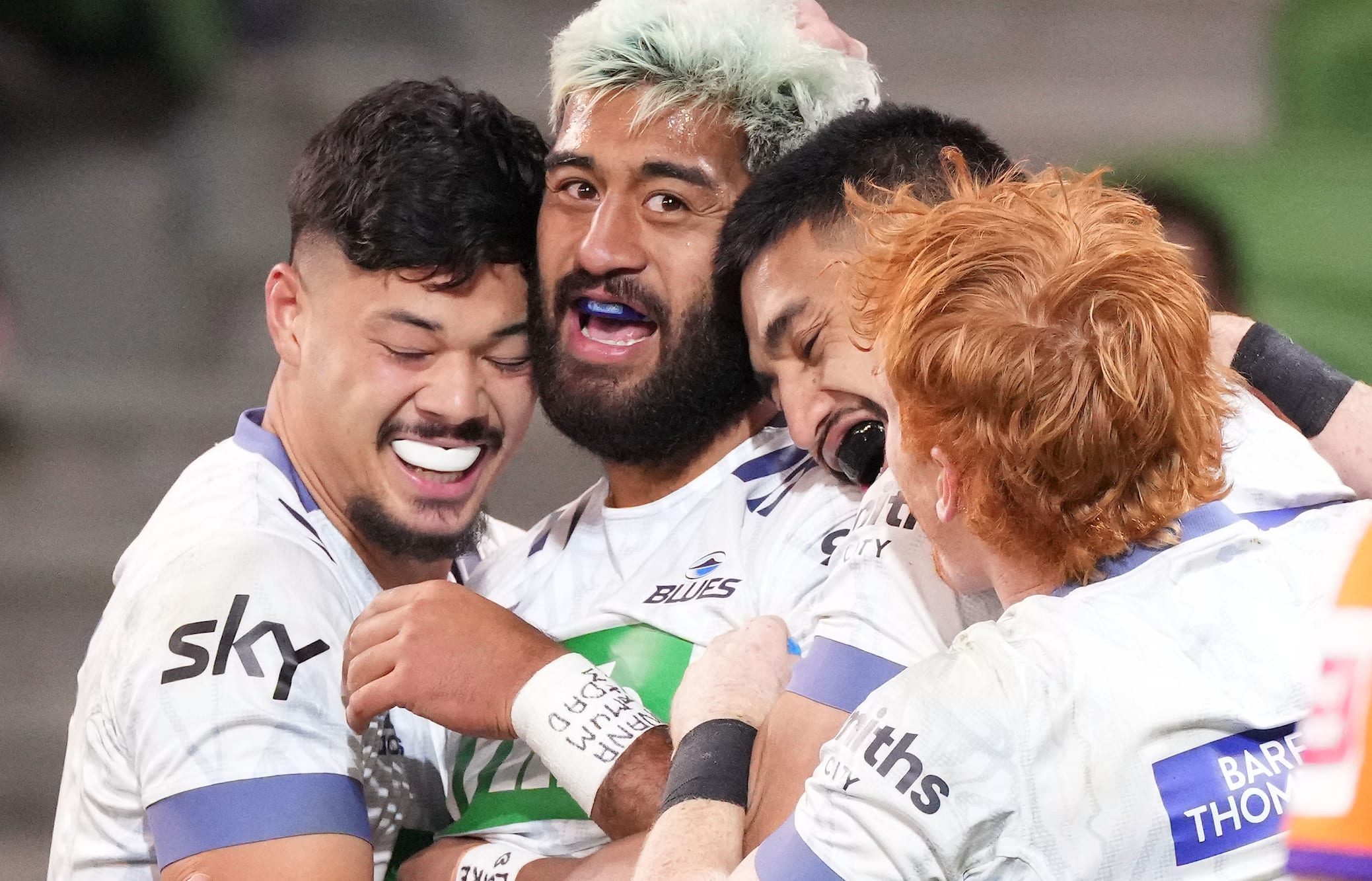 The Blues Akira Ioane, centre, after scoring a try in Round 1 of the Trans-Tasman Super Rugby against the Rebels at AAMI Park in Melbourne.