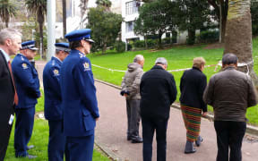 Police and members of the public at Myers Park on Tuesday.
