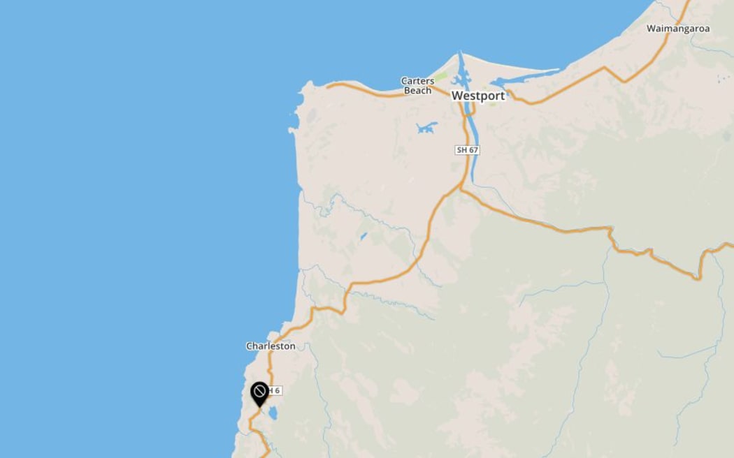 The area where the road is blocked.