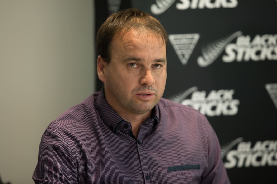 Hockey New Zealand chief executive Ian Francis speaking to media at a press conference.