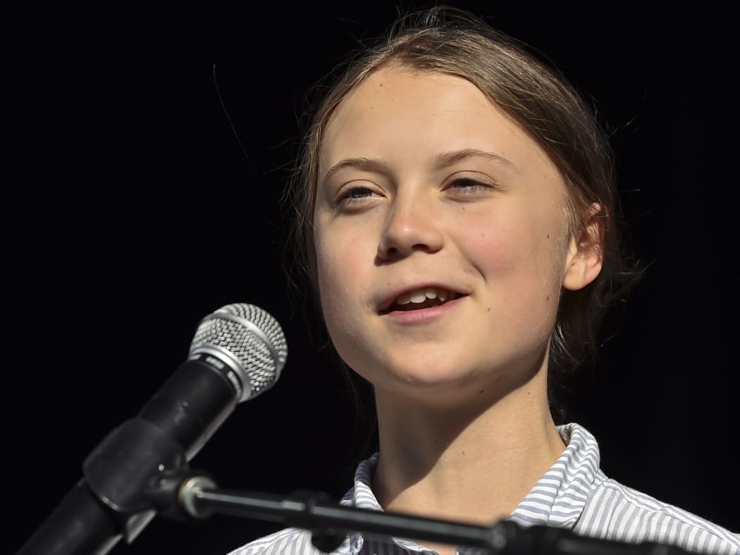 Swedish climate activist Greta Thunberg takes to the podium to address young activists and their supporters in Montreal.