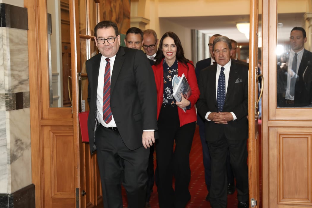 Grant Robertson, Jacinda Ardern, Winston Peters and others on their way to the debating chamber for budget 2019
