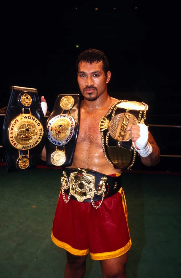 Ray Sefo collecting world champion titles in 1998