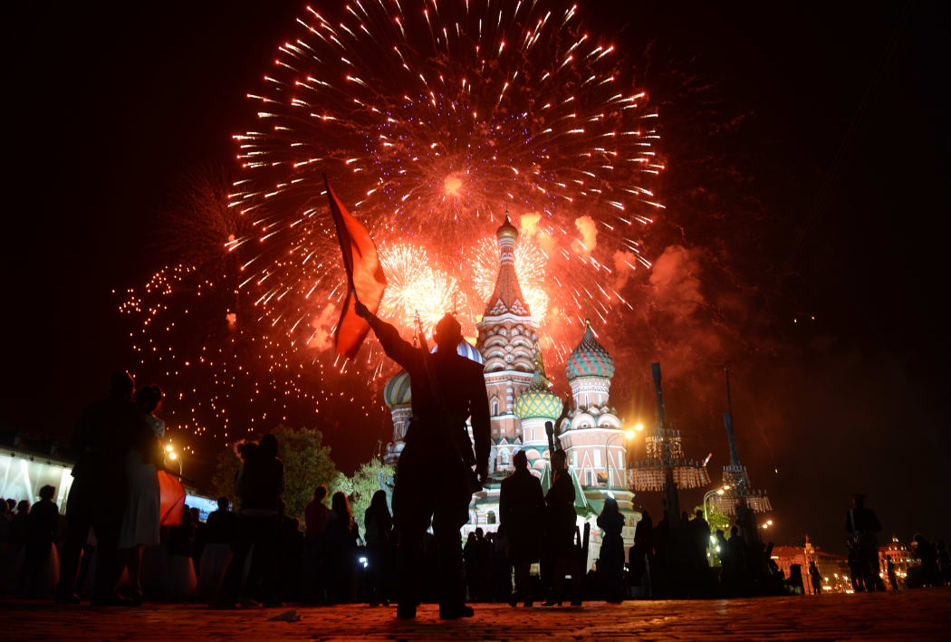 Fireworks explode above Moscow's Red Square on Victory Day.
