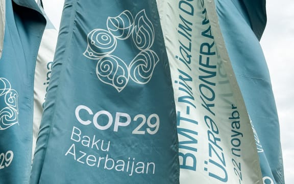 COP29 logo is seen in Baku, Azerbaijan on September 17, 2024. (Photo by Jakub Porzycki/NurPhoto) (Photo by Jakub Porzycki / NurPhoto / NurPhoto via AFP)