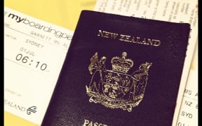 A photo of Ally's passport and boarding pass. Like a boss.