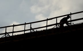 Silhouette of a construction worker