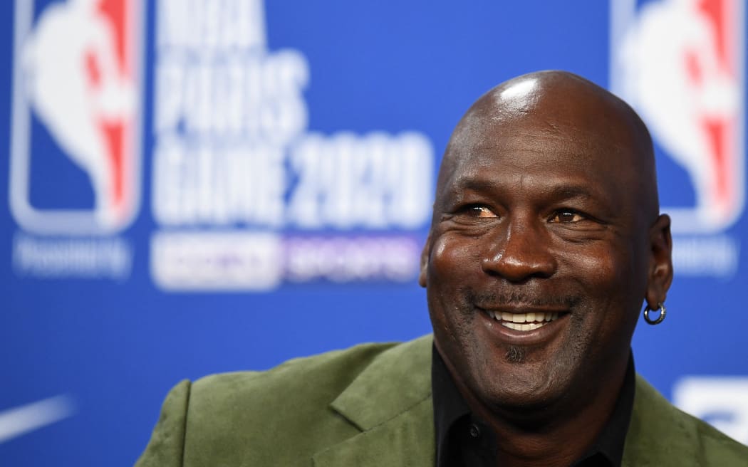 A pair of sneakers worn by NBA superstar Michael Jordan early in his career sold for nearly $1.5 million on October 24, 2021, setting a record price at auction for game-worn footwear, Sotheby's said.