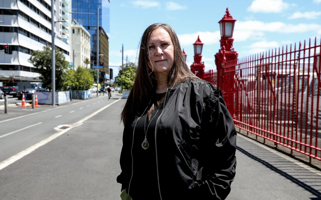 Michelle Mann standing by the spot where she was hit.