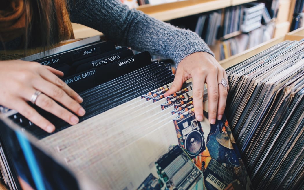 A woman shops for records