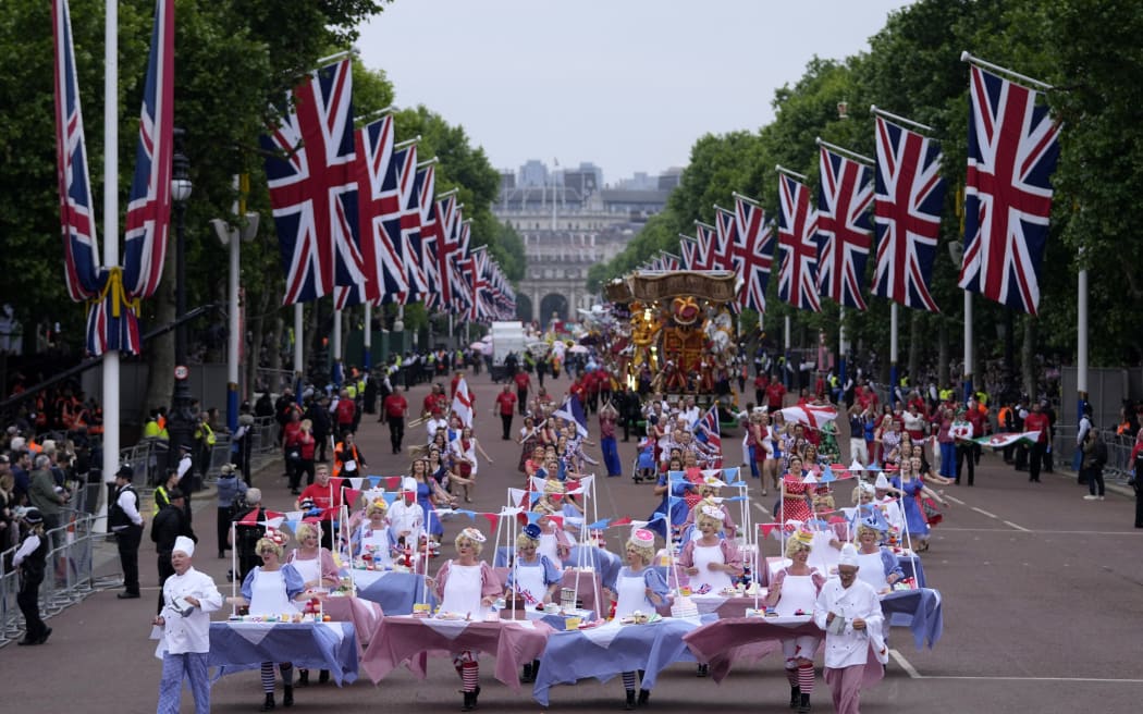 Performers parade during the Platinum Pageant in London on 5 June 2022 as part of Queen Elizabeth II's platinum jubilee celebrations.