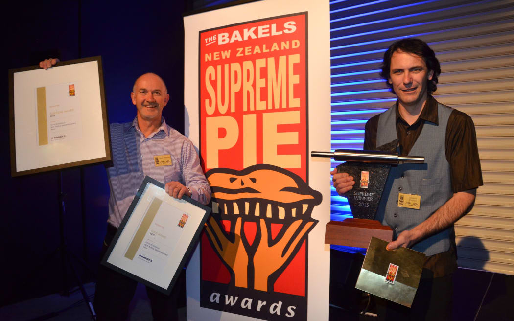 2015 Supreme Pie Award-winning baker Shane Forster (R) and New World Greenmeadows owner Iain Beatton. Their humble humble potato top pie won top prize with its "flavoursome filling, super creamy potato top and delicious pastry shell"
