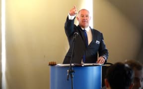 David Johnstone from Barfoot & Thompson in action in a series of house auctions in Manukau, Auckland.