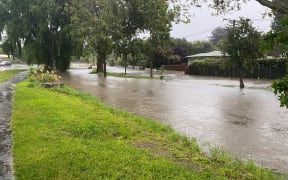 The Heathcote River in Christchurch has broken its banks.