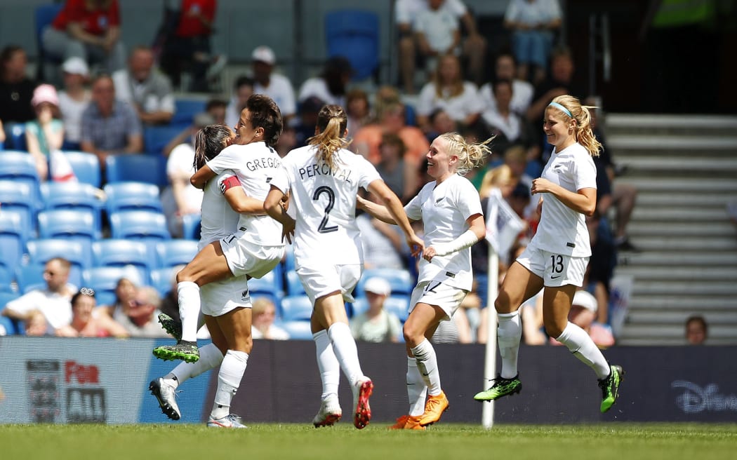 Sarah Gregorius of New Zealand celebrates scoring against England.