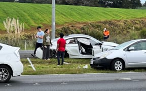 Emergency services at the scene of a horror crash on Auckland's State Highway 1 near Ramarama on 26 August 2024.