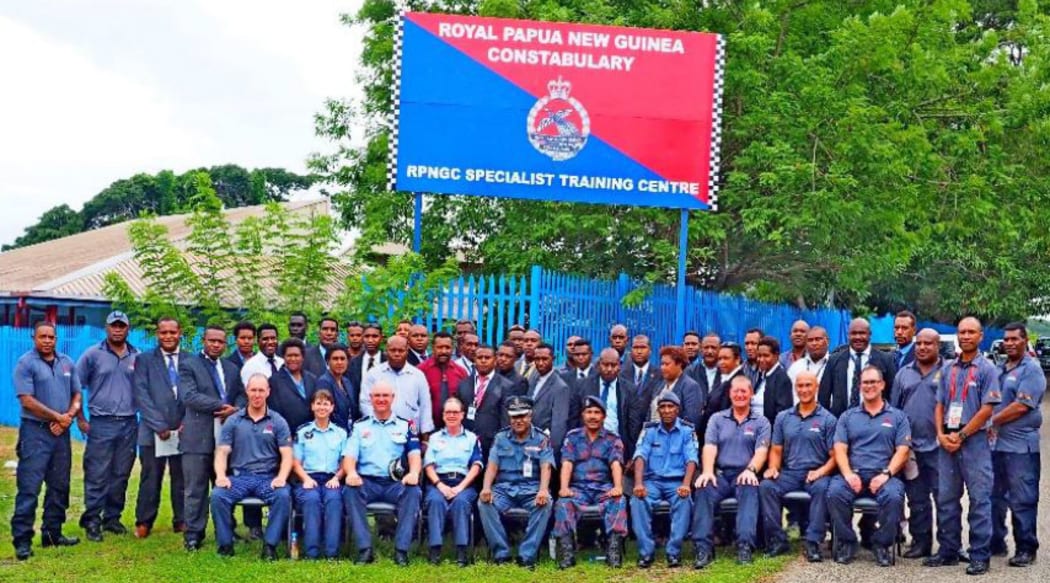 Close Protection Personnel with the Chief Superintendent, Kabib Lamu (seated front fifth from left) at the RPNGC Specialist Training Centre in Port Moresby.