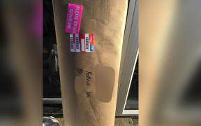 A PBT Couriers driver left this package, with a gun inside, leaning next to the front door because no one was home.