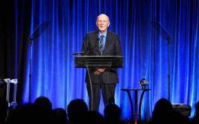 Julian Robertson speaking on stage at The Christopher & Dana Reeve Foundation "A Magical Evening" on 20 November, 2014 in New York City.