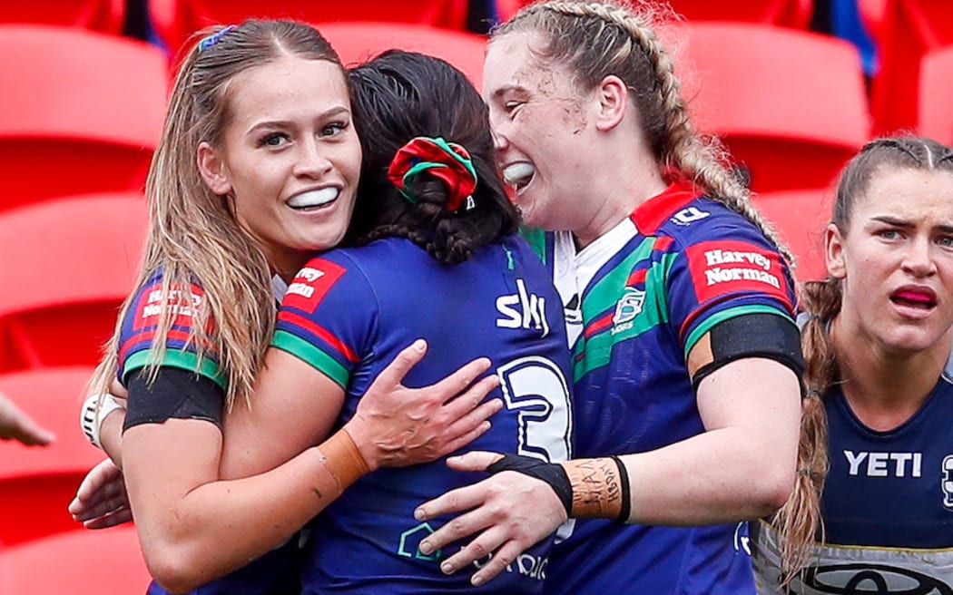 Tyra Wetere celebrates with teammates after scoring but has the try disallowed. North Queensland Cowboys Women v One New Zealand Warriors Women.